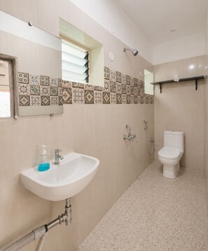 Comfort Apartment | Bathroom - Bhumika by evaddo stays (Ashvem)