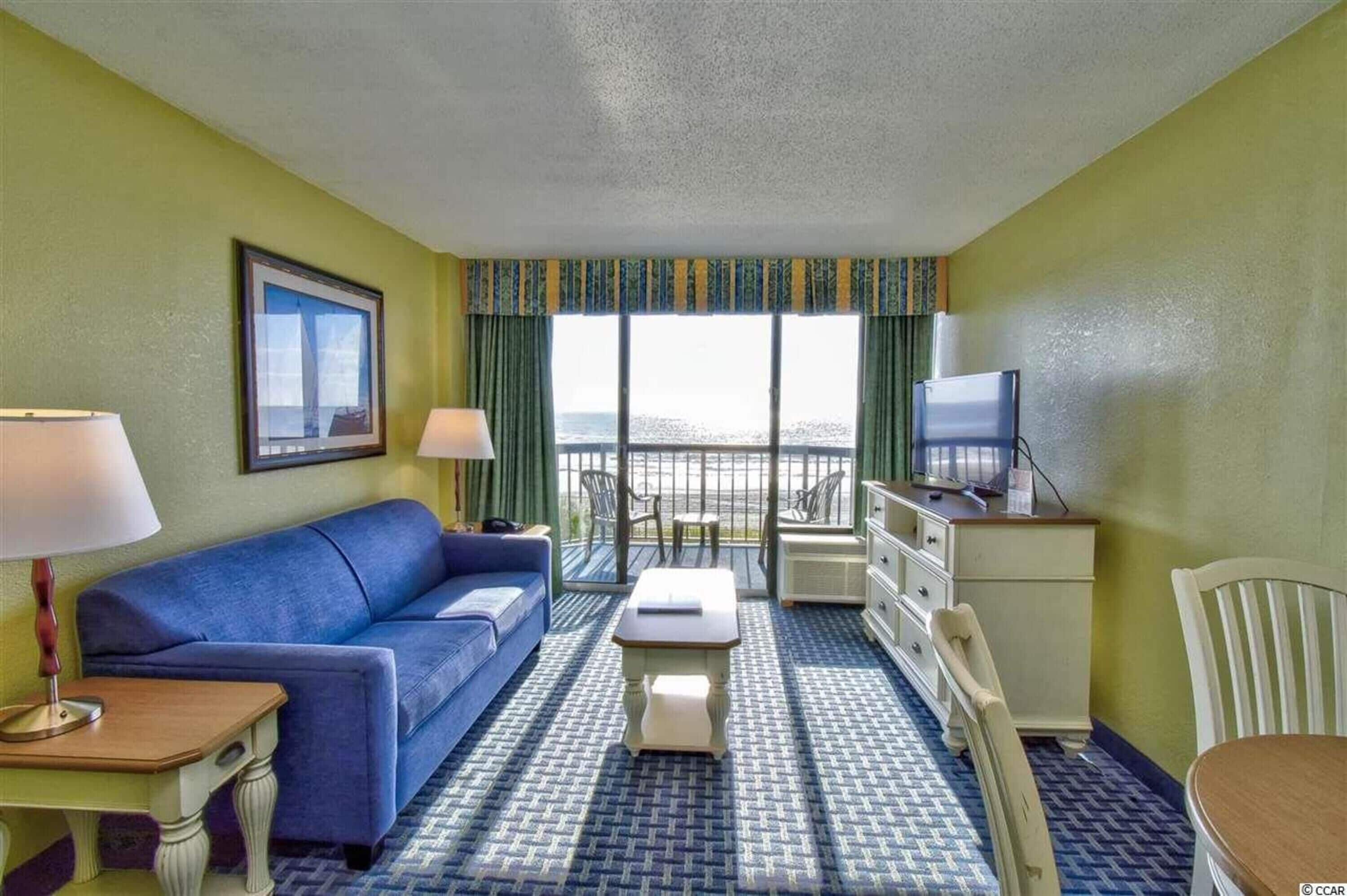 Comfort-lejlighed - 1 soveværelse - balkon - havudsigt | Stue | 32-tommers smart-tv med satellitkanaler