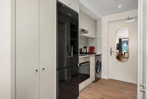 Fridge, microwave, oven, stovetop - Dolce Vita | Modern Sea Point Gem (Cape Town)