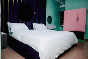 Family Room, Balcony, City View | Desk, laptop workspace, blackout drapes, soundproofing - Nexus Xpress Hotel (Abuja)