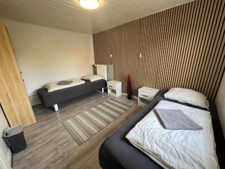 Quarto conforto, varanda | Quartos à prova de som, Wi-Fi de cortesia, roupa de cama. Fasan Sleeping