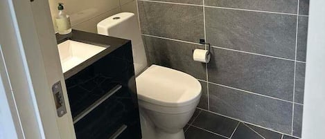 Comfort Room, Patio | Bathroom | Shower, hair dryer, towels, toilet paper