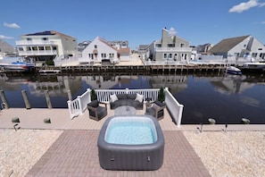 Terrace/patio - Waterfront Oasis Heated Pool, Dock & Outdoor Fun. 3 miles to LBI beaches! (Stafford Township)