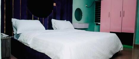 Deluxe Room, Balcony, City View | Desk, laptop workspace, blackout curtains, soundproofing