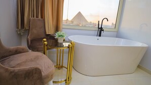 Shower, jetted tub, bidet, towels - First site of pyramids view hotel (Giza Governorate)