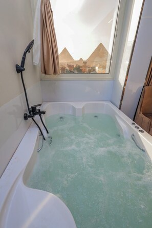 Shower, jetted tub, bidet, towels - First site of pyramids view hotel (Giza Governorate)
