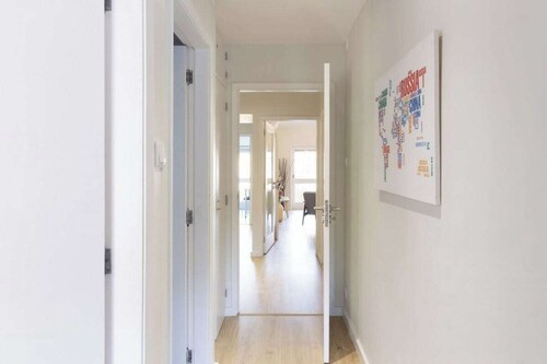 Trendy Bright Flat w/Balcony | Jacuzzi by HostWise