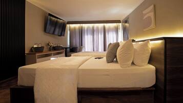 Premium bedding, down duvets, memory-foam beds, desk