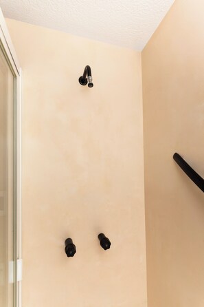 Shower, eco-friendly toiletries, hair dryer, towels