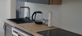 Ferienhaus Alex is a spacious, comfortable vacation home in Großefehn, ideal for families and groups of up to 6-8 people. <br>On approx. 95 m² you will find bright, friendly furnished rooms, a fully equipped kitchen and a spacious living room with...