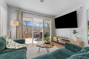 Superior Suite, Non Smoking, Pets Not Allowed | Living room | 65-inch Smart TV with digital channels, fireplace, Netflix