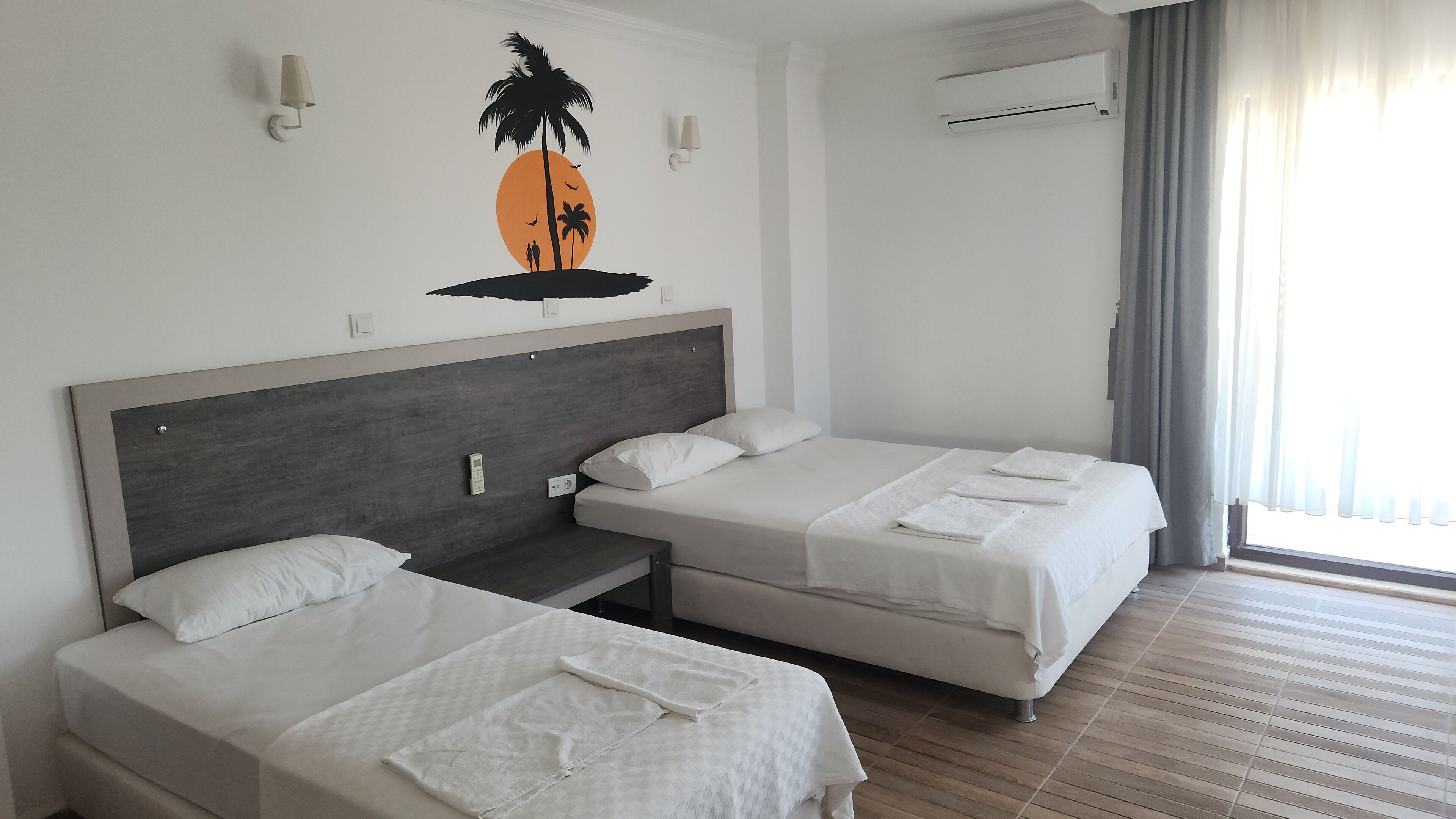 패밀리 쿼드룸, 부분 바다 전망 | 책상, 노트북 작업 공간, 무료 WiFi