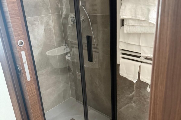 Comfort Double or Twin Room | Bathroom | Shower, hair dryer, towels, soap