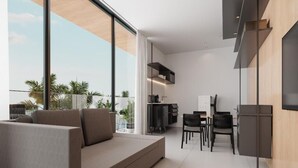 A modern living room with a sofa, dining area, and kitchen. - PORTO 2 LIFE GAV- MARÉ ALTA (Ipojuca)