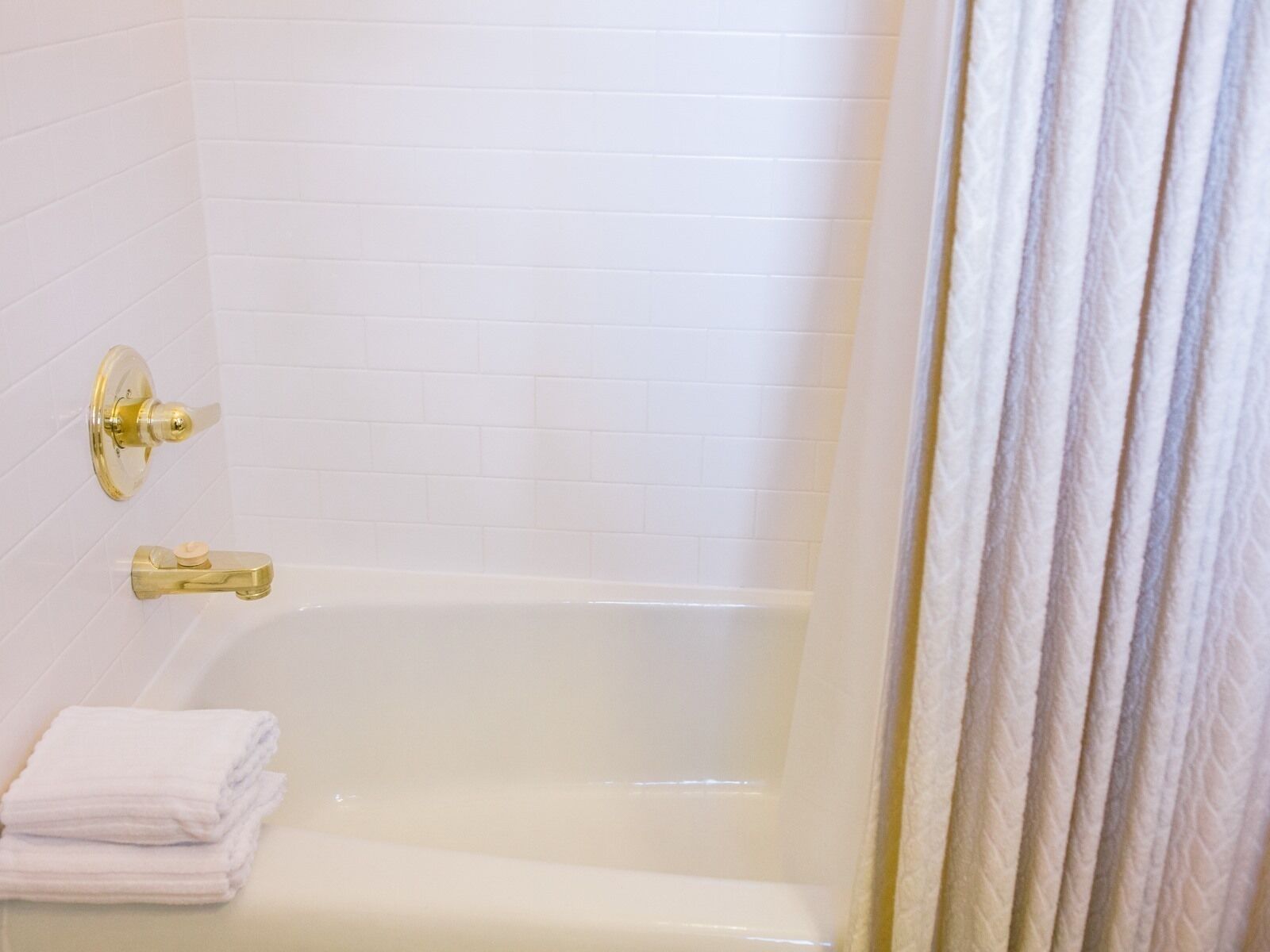Shower, towels, soap, toilet paper