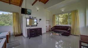 Deluxe Studio Suite, Balcony, Mountain View | Living area | 30-inch plasma TV with satellite channels - Hanthana Villa  (Kandy)