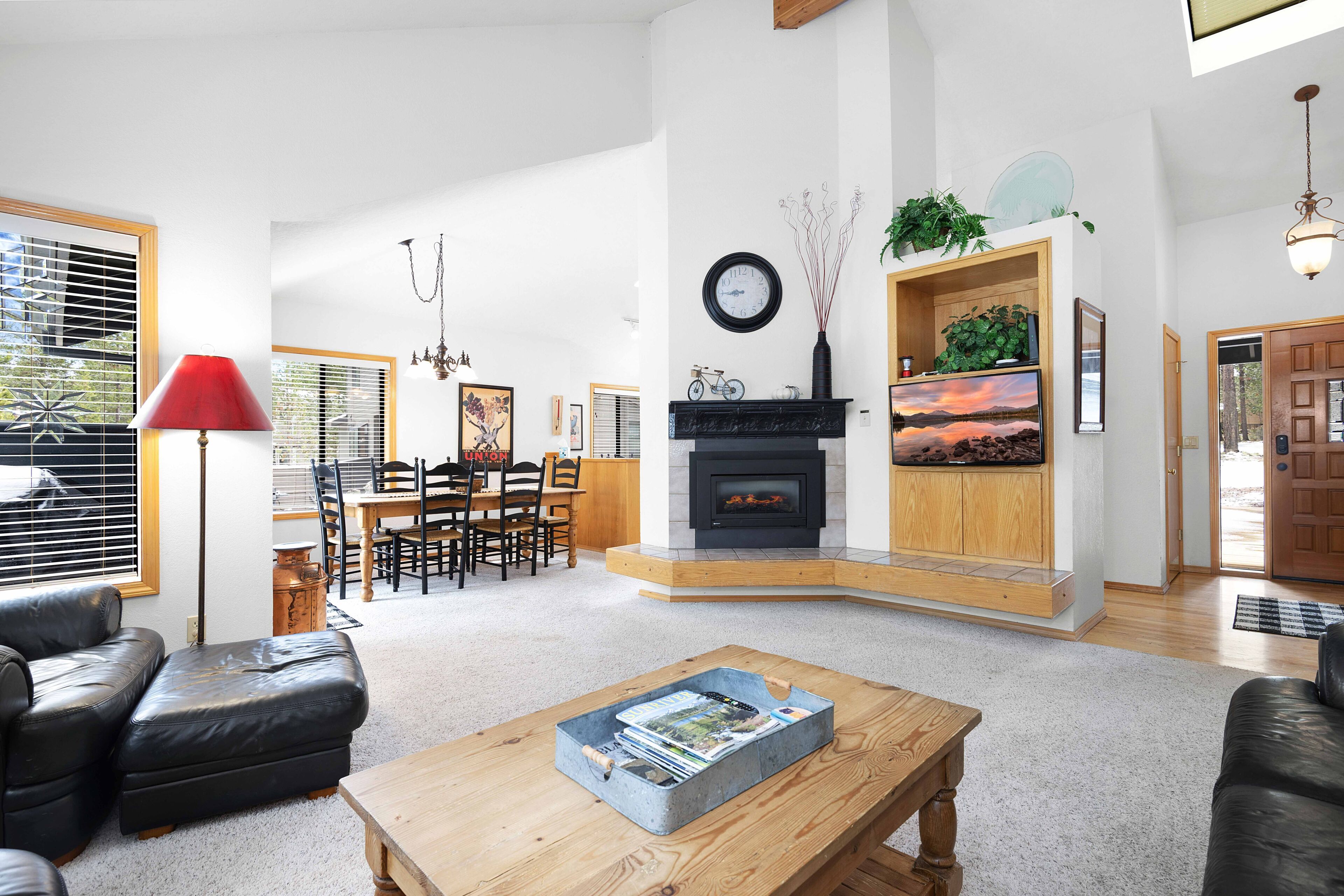 TV, fireplace, books