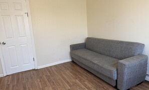 Living area - Private one-bedroom one-bathroom apartment with private street entrance in convenient area (Perth Amboy)