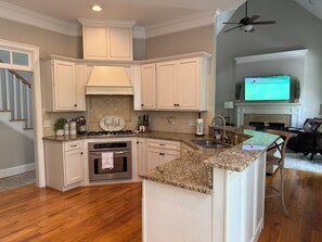 Fridge, microwave, oven, stovetop - MASTERS RENTAL 2027- 5 BR house w/ large basement in North Augusta- 5 mi to ANGC (North Augusta)