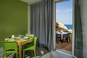 Apartment, 1 Bedroom, Smoking | Dining room - APT Rino Sea View Basement in Villa Rosaria (Castellammare del Golfo)