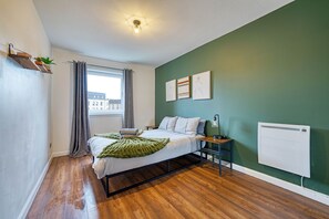 2 dormitorios, tabla de planchar con plancha, wifi y ropa de cama