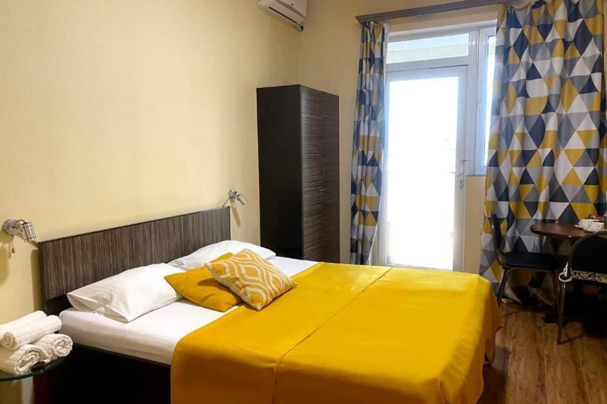 Double Room, City View | In-room safe, soundproofing, iron/ironing board, free WiFi