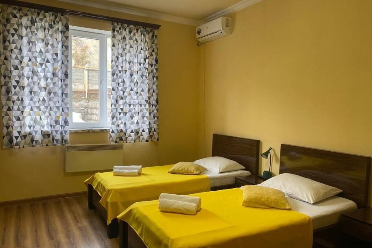 Twin Room, Courtyard View | In-room safe, soundproofing, iron/ironing board, free WiFi