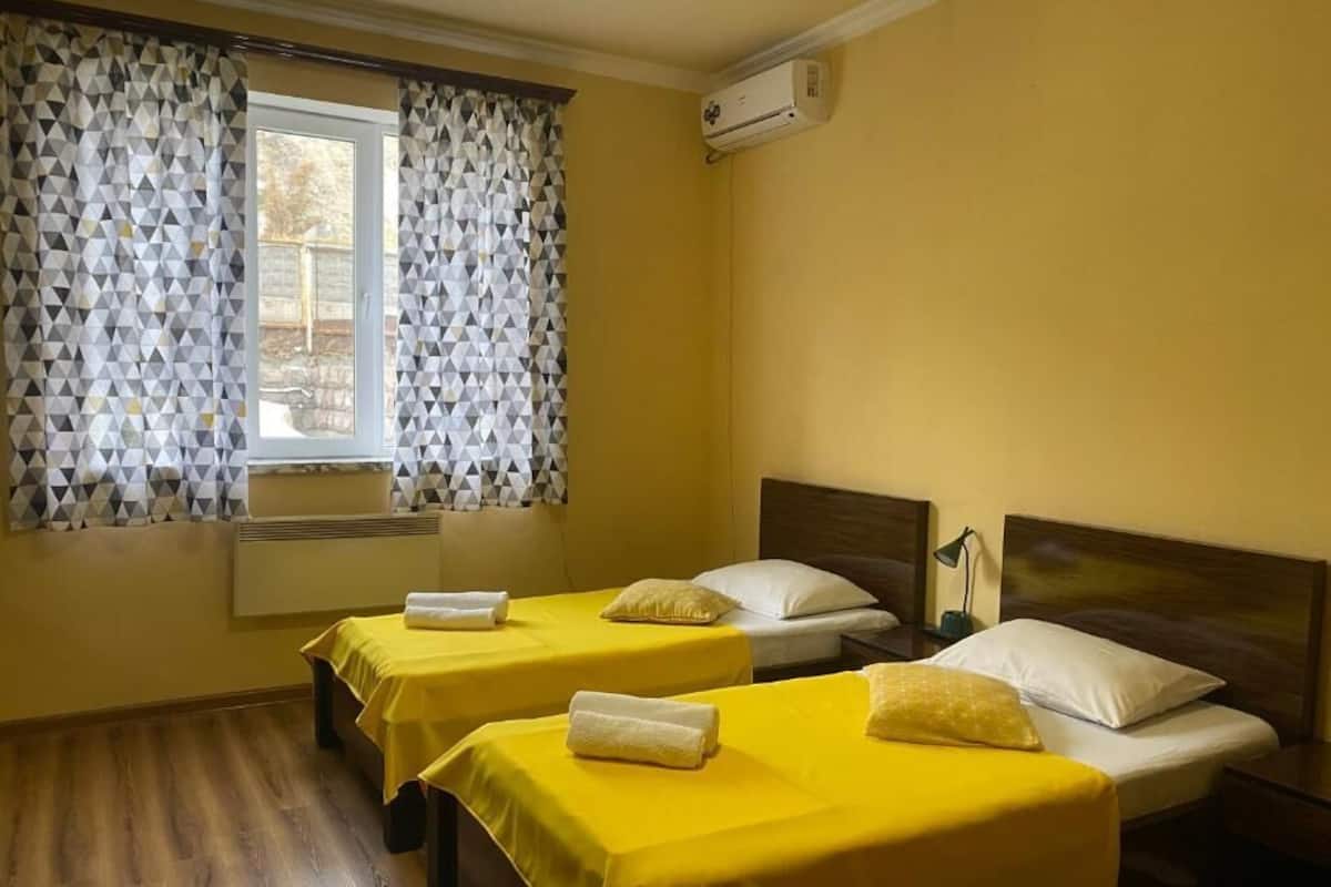 Twin Room, Courtyard View | In-room safe, soundproofing, iron/ironing board, free WiFi