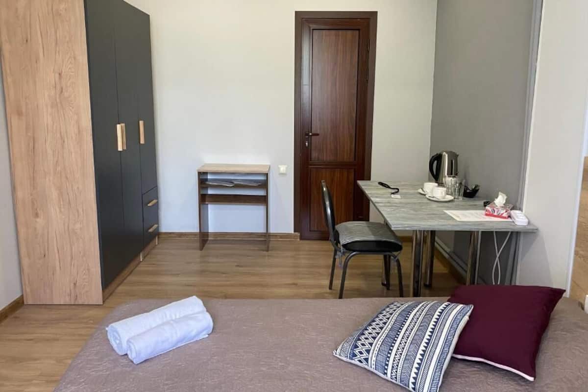 Twin Room, Courtyard View | In-room safe, soundproofing, iron/ironing board, free WiFi