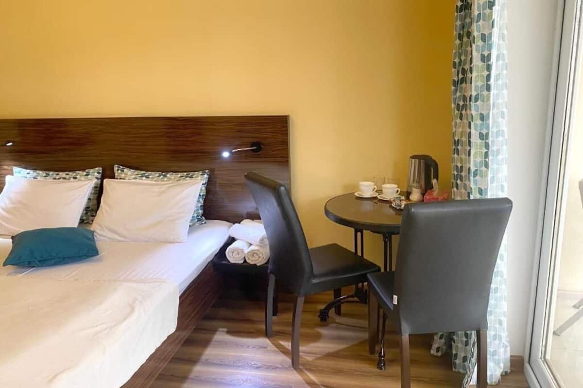 Double Room, Balcony, City View | In-room safe, soundproofing, iron/ironing board, free WiFi