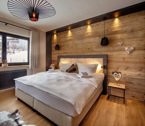 Alpenchalet am Lech - modern, alpenländisch, direkt am Fluss, 5 min zum Skilift