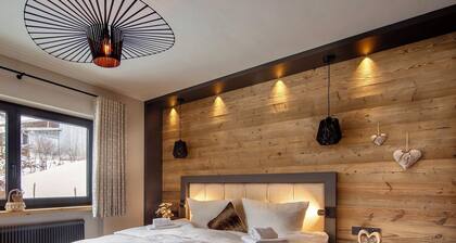 Alpenchalet am Lech - modern, alpenländisch, direkt am Fluss, 5 min zum Skilift