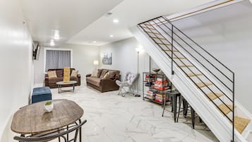 TV, fireplace, books