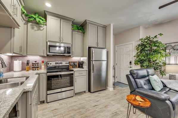 Fridge, microwave, stovetop, coffee/tea maker