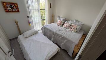 Deluxe Apartment, Patio, Garden View | Iron/ironing board, free WiFi