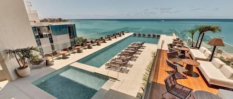 Indoor pool, outdoor pool, open 9:00 AM to 9:00 PM, sun loungers