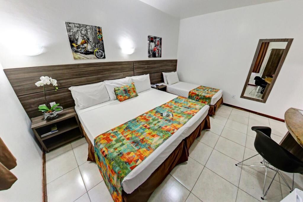 Kamar Triple Deluks, pemandangan kebun | Setrika/meja setrika, Wi-Fi gratis, dan dapat diakses tamu berkursi roda