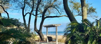 New to the market! A Peaceful, Natural Beachfront Retreat! Pools Tennis Sauna!