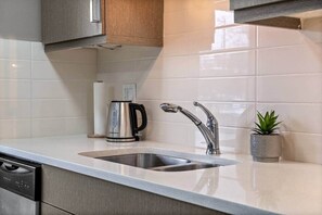 Fridge, microwave, oven, stovetop - The Ridge – Modern 2BR Near 17th Ave in Bankview (Calgary)