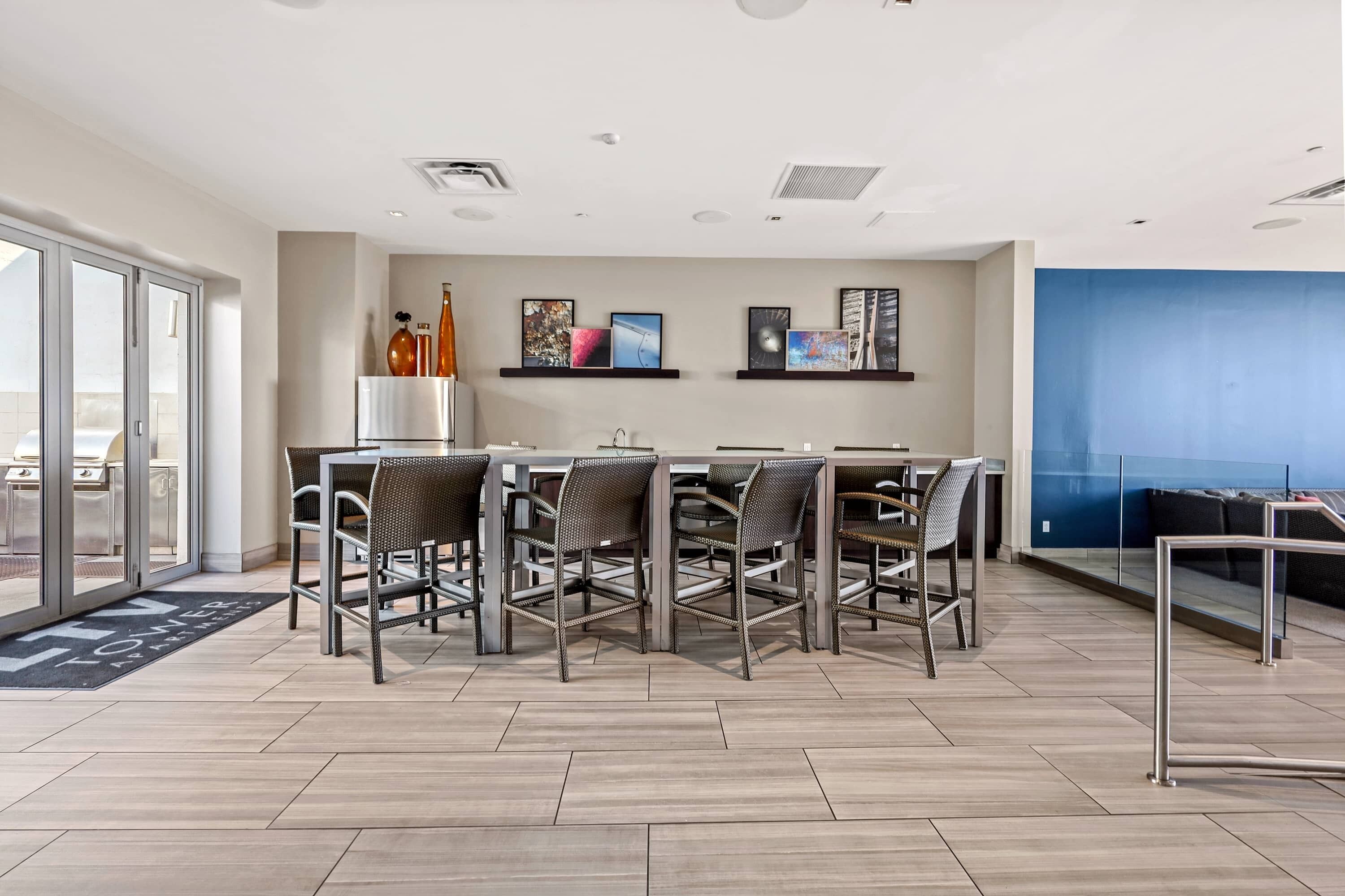 Stylish event lounge with bar seating ideal for gatherings and casual socials.