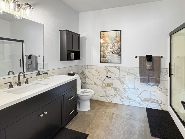 Shower, hair dryer, towels, soap