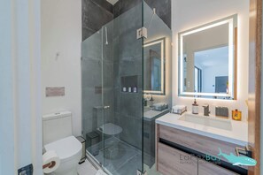 Shower, hair dryer, shampoo