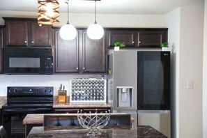 Family House, Courtyard View | Private kitchenette | Electric kettle