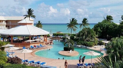 Beachfront 2BR Coastal Townhouse with Pool, Ocean Views & Beach Access