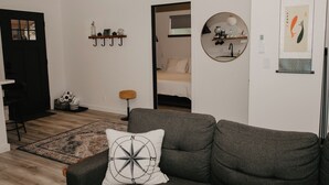 Living area - Parkway Grove Cabins 1 Bedroom with Private Hot Tub and Spa Shower (Miranda)