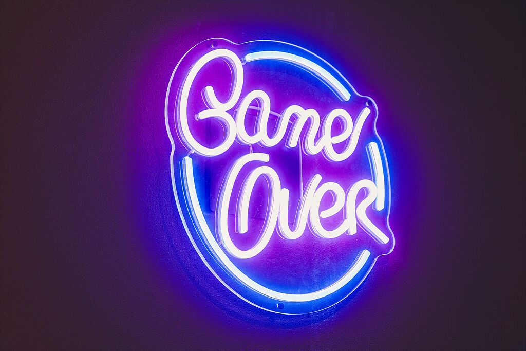 A neon sign with the text "Game Over".