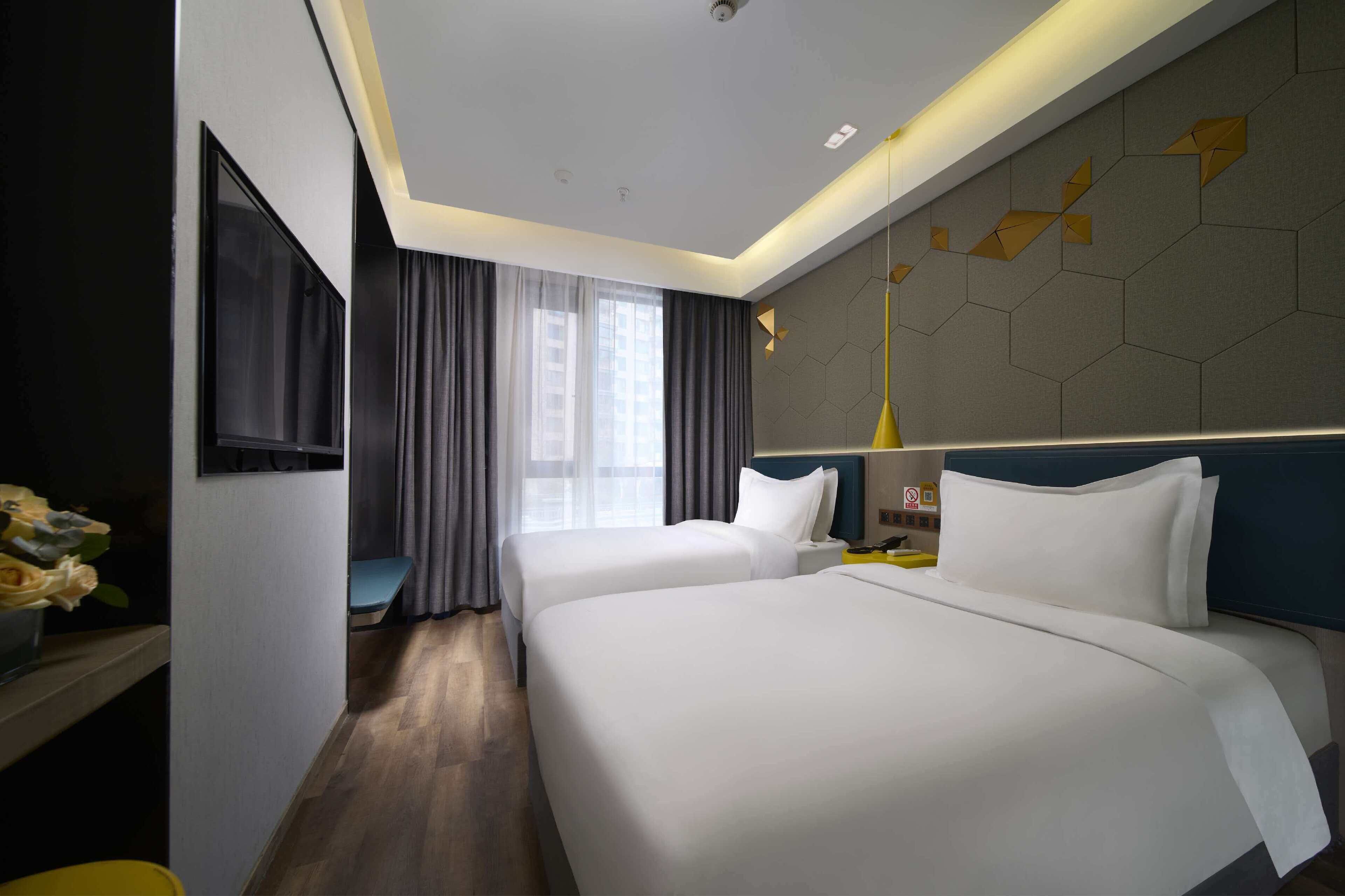 Desk, laptop workspace, free WiFi, bed sheets