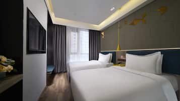 Desk, laptop workspace, free WiFi, bed sheets