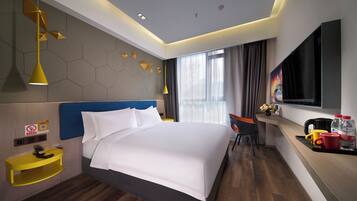 Desk, laptop workspace, free WiFi, bed sheets