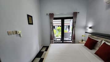Bungalow, patio, pemandangan kebun | Wi-Fi gratis dan seprai linen
